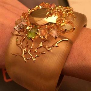 Alexis Bittar hinged bangle cuff bracelet in golden beige lucite with gems.